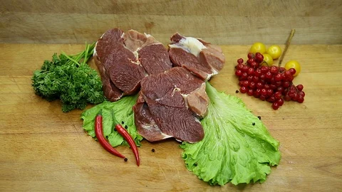 Beef, raw pieces of decor from the chef Stock Footage 130002794
