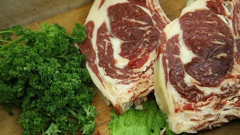 Beef, raw pieces of decor from the chef Stock Footage 130002796