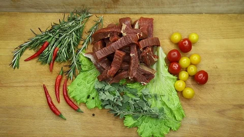 Beef, raw pieces of decor from the chef Stock Footage 130002800