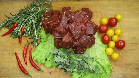 Beef, raw pieces of decor from the chef Stock Footage 130002801