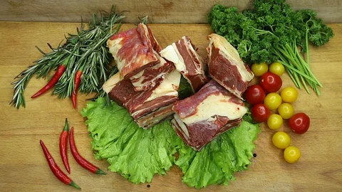 Beef, raw pieces of decor from the chef Stock Footage 130003235