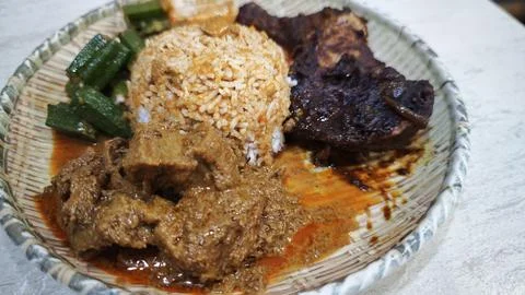 Beef Rendang and Mutton Rendang at a Traditional Nasi Padang Rice Stall Stock Photos
