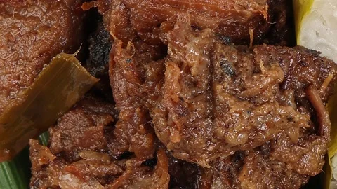Beef rendang curry cooked spice and coconut milk  with pulut lemang sticky .. Stock Footage 237905646
