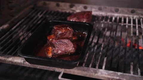 Beef ribs are cooked in the grill oven Stock Footage 159242302