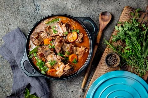 Beef ribs Bourguignon. Beef ribs stewed with carrot, onion in red wine. France Stock Photos