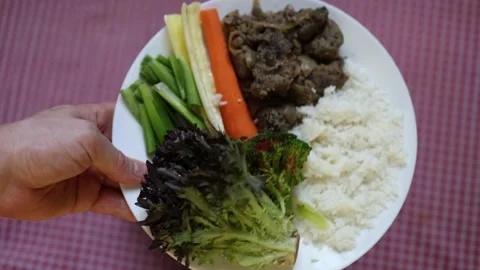 Beef rice and fresh vegetables prepared for balanced nutrition Stock Footage 340221483
