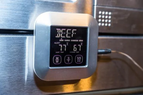 Beef roasting meat temperature conrol unit on silver oven Photos