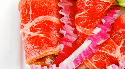 Beef rolls on white Stock Footage 38732811