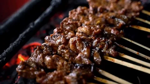 Beef satay and chicken satay in one grill seem close Stock Footage 272297442