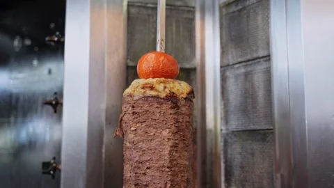 Beef Shawarma Roasting on Vertical Spit Stock Footage 335188856
