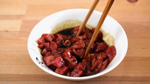 Beef slices in dark soy sauce Stock Footage 35935168