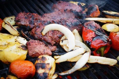 Beef steak and vegetable grill mix. Stock Photos