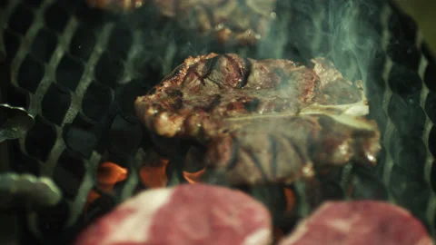Beef Steak Cook Rotation on Barbeque Close-up Stock Footage 156892076
