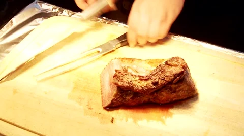 Beef steak. Cutting in a restaurant for the guest Stock Footage 52496498