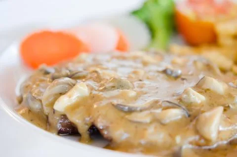 Beef steak on dish Stockfoto's