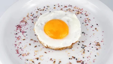 Beef steak with egg yolk on top, served in Restaurant Stock Footage 95153287