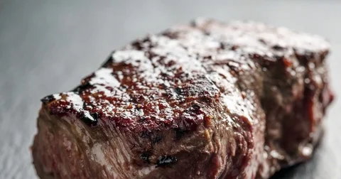 Beef steak from entrecote part on slate board Stock Footage 84892450