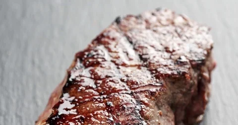 Beef steak from entrecote part on slate board Stock Footage 84893494