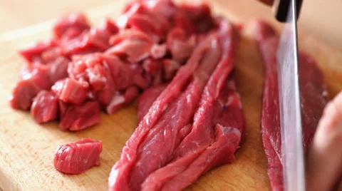 Beef steak finely sliced and chopped; close up Stock Footage 35934659