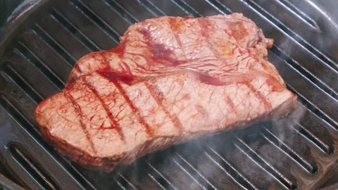 Beef steak frying in UHD Stock-Footage 151657087