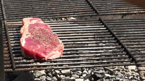 Beef steak on a grill 4K Stock Footage 130824691