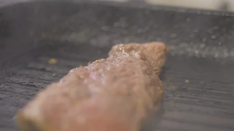 Beef steak on grill close up Stock Footage 115069265
