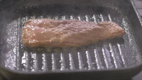 Beef steak on grill close up Stock Footage 115070541