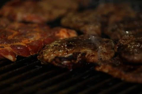 Beef steak on the grill with flames Foto stock