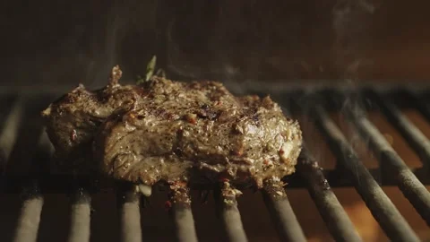 Beef steak is grilled on fire. Stock Footage 236900603
