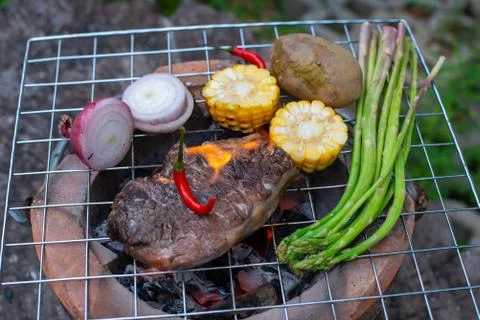 Beef steak grilling Foto stock