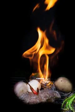 Beef steak grilling Stock Photos