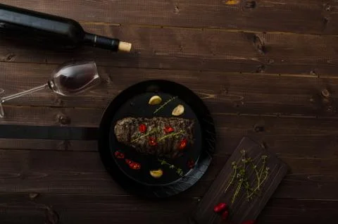 Beef steak with herbs and chilli, product photo Stock Photos