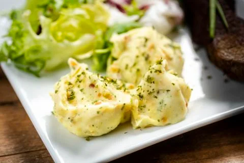 Beef steak with mashed potatoes and rocket salad Stock Photos