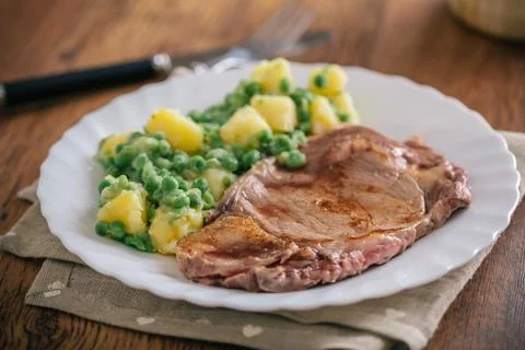 Beef steak with mixed vegetables. High quality photo. Stock Photos