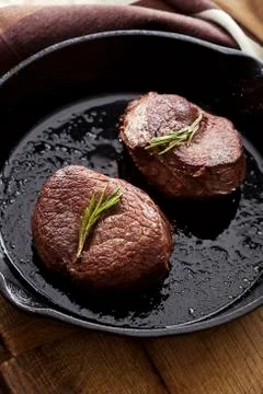 Beef steak in pan Stock Photos