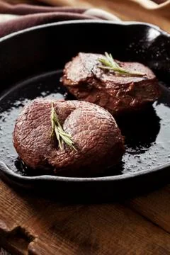 Beef steak in pan Stock Photos