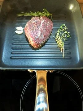 Beef steak in the pan Stock Photos
