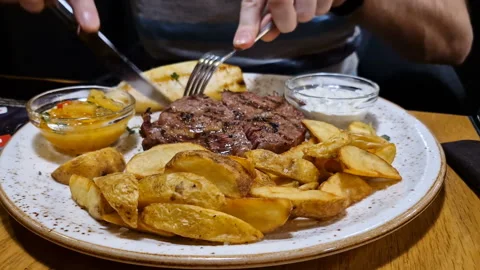 Beef steak with potatoes close-up. Restaurant Stock Footage 246587289
