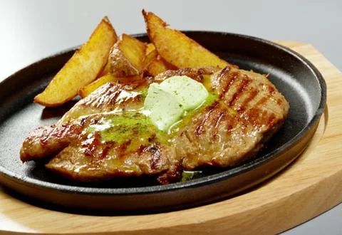 Beef steak with potatoes Foto stock
