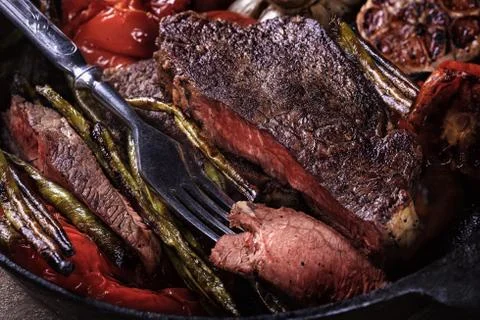 Beef steak with roasted vegetables Stock Photos