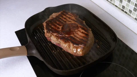 Beef Steak Roasting on Grill Pan and Drizzling by Olive Oil, Juicy Meat Steak Video stock 120792835