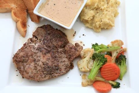 Beef steak with salad Stock Photos