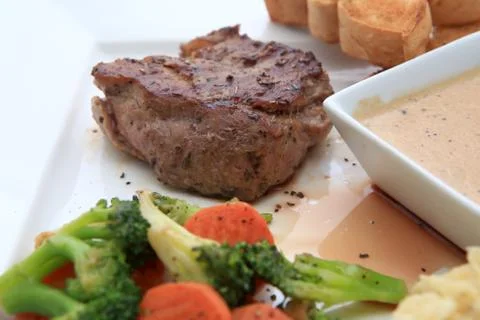 Beef steak with salad Stock Photos
