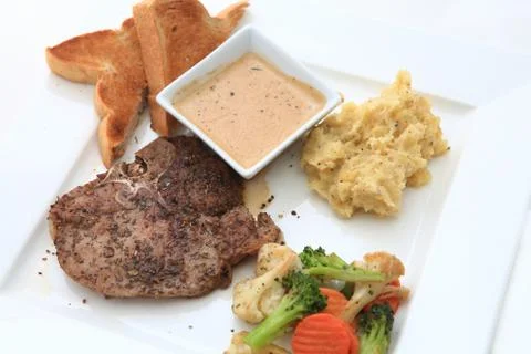 Beef steak with salad Foto stock