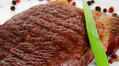 Beef steak served with red tomato Vídeos de archivo 24422934