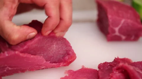 Beef steak slicing with sharp blade - close up Stock Footage 44344108