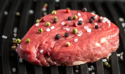 Beef steak with spices Stock Photos