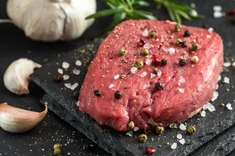 Beef steak with spices Stock Photos
