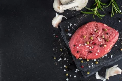 Beef steak with spices Stock Photos