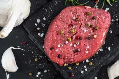 Beef steak with spices Stock Photos